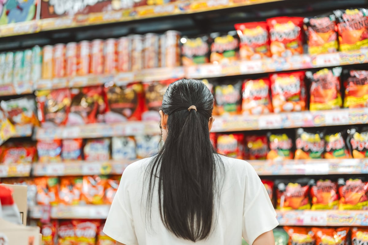 Consumer shopping at a local supermarket — warm, personal service at a small business