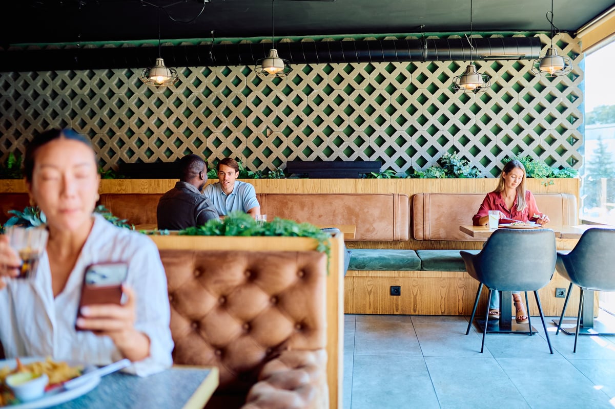 Restaurant brand identity applied across the room and menu